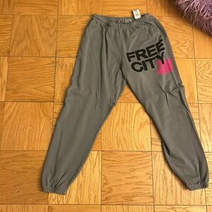 Free city sweatpants that are gray and pink